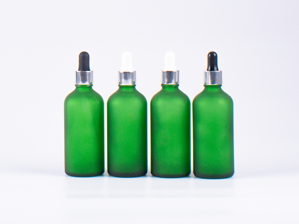 Grünglasflasche 100ml, mit Pipette silber-glanz